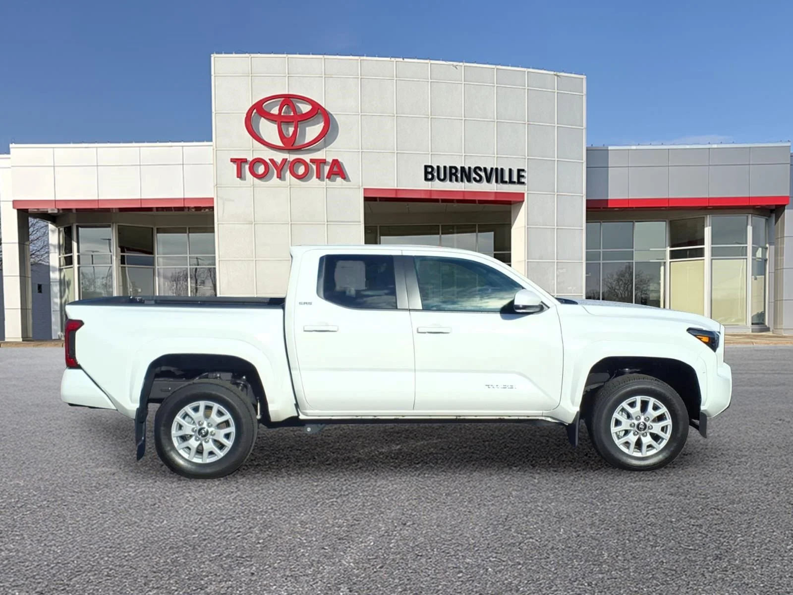 Used 2026 Toyota Tacoma SR5 with VIN 3TMKB5FNXTM053907 for sale in Burnsville, Minnesota