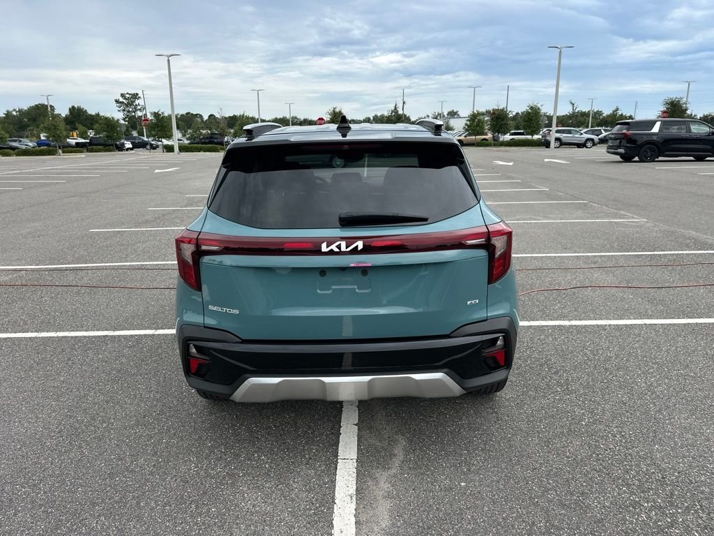 Used 2025 Blue Kia S image 7