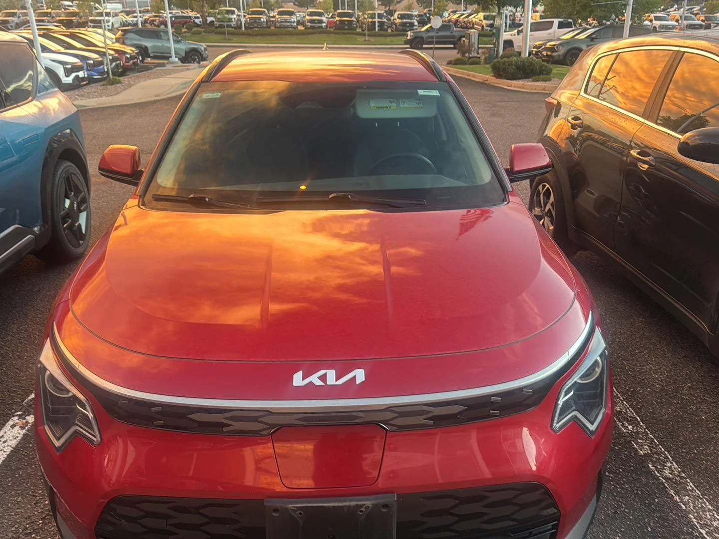 Certified Used 2023 Runway Red Kia Wind image 1