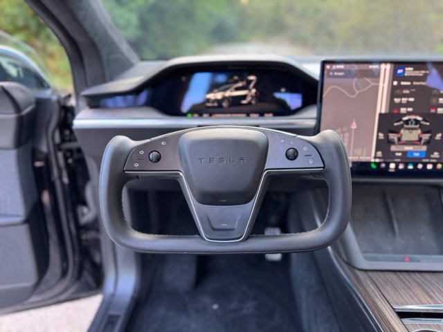 Used 2022 Solid Black Tesla Base image 21