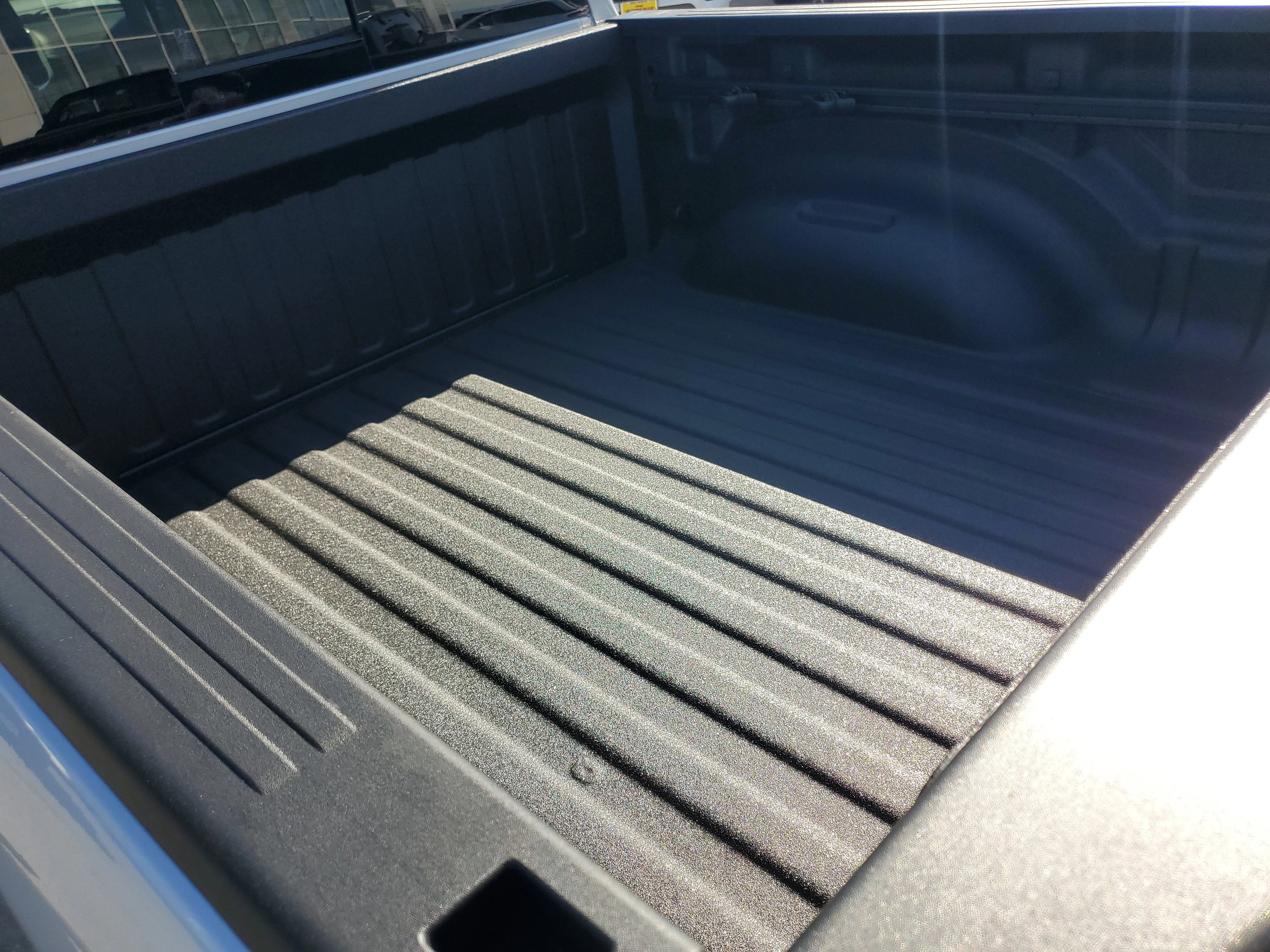 New 2026 Silver Zynith Exterior Paint RAM Laramie image 25