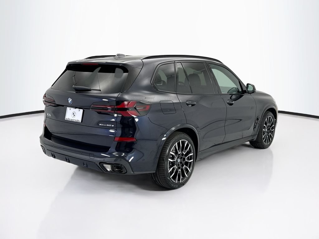 New 2026 Carbon Black Metallic BMW xDrive50e image 5