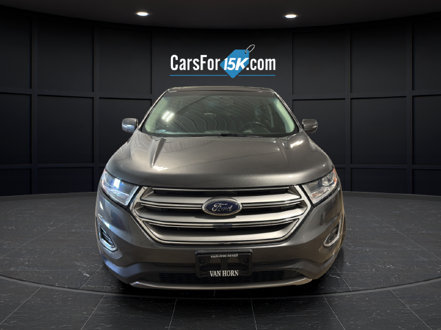 Used 2015 Magnetic Metallic Ford Titanium image 2