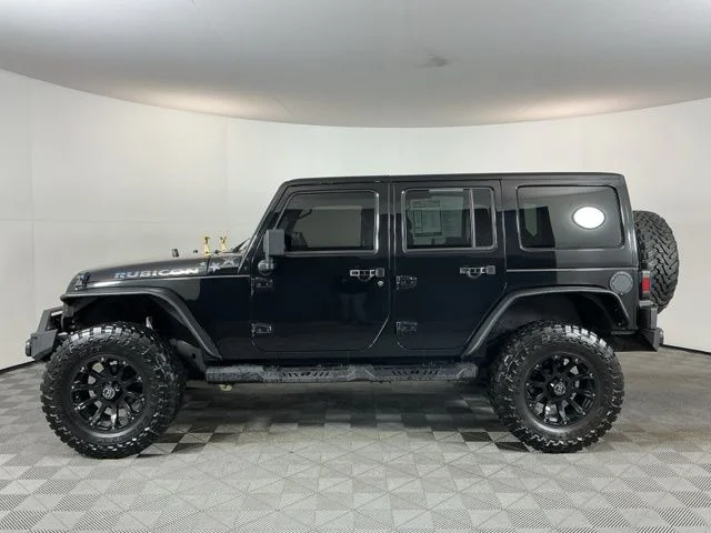 Used 2012 Black Jeep Unlimited Rubicon image 8
