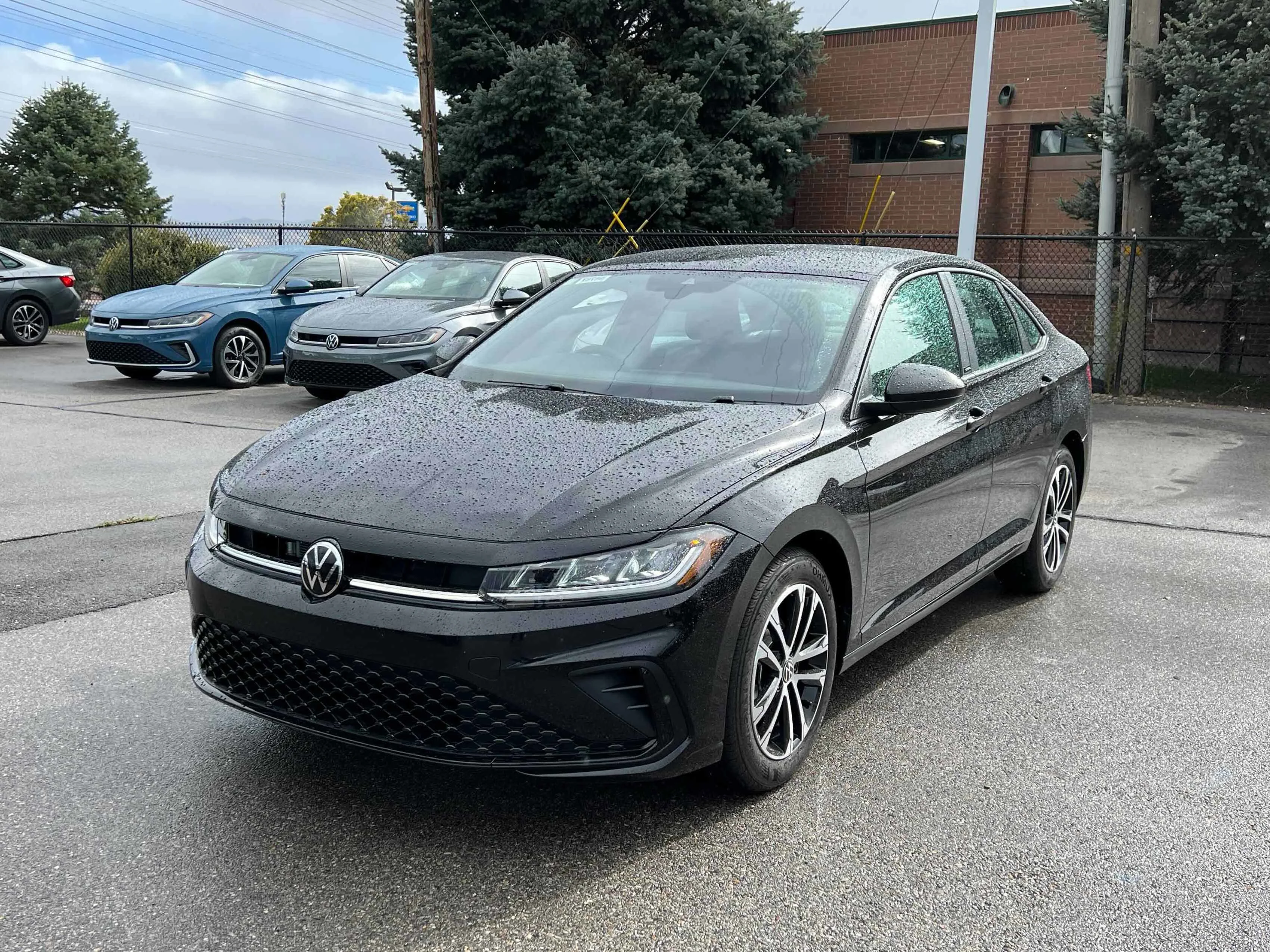 New 2026 Black Volkswagen Sport image 1