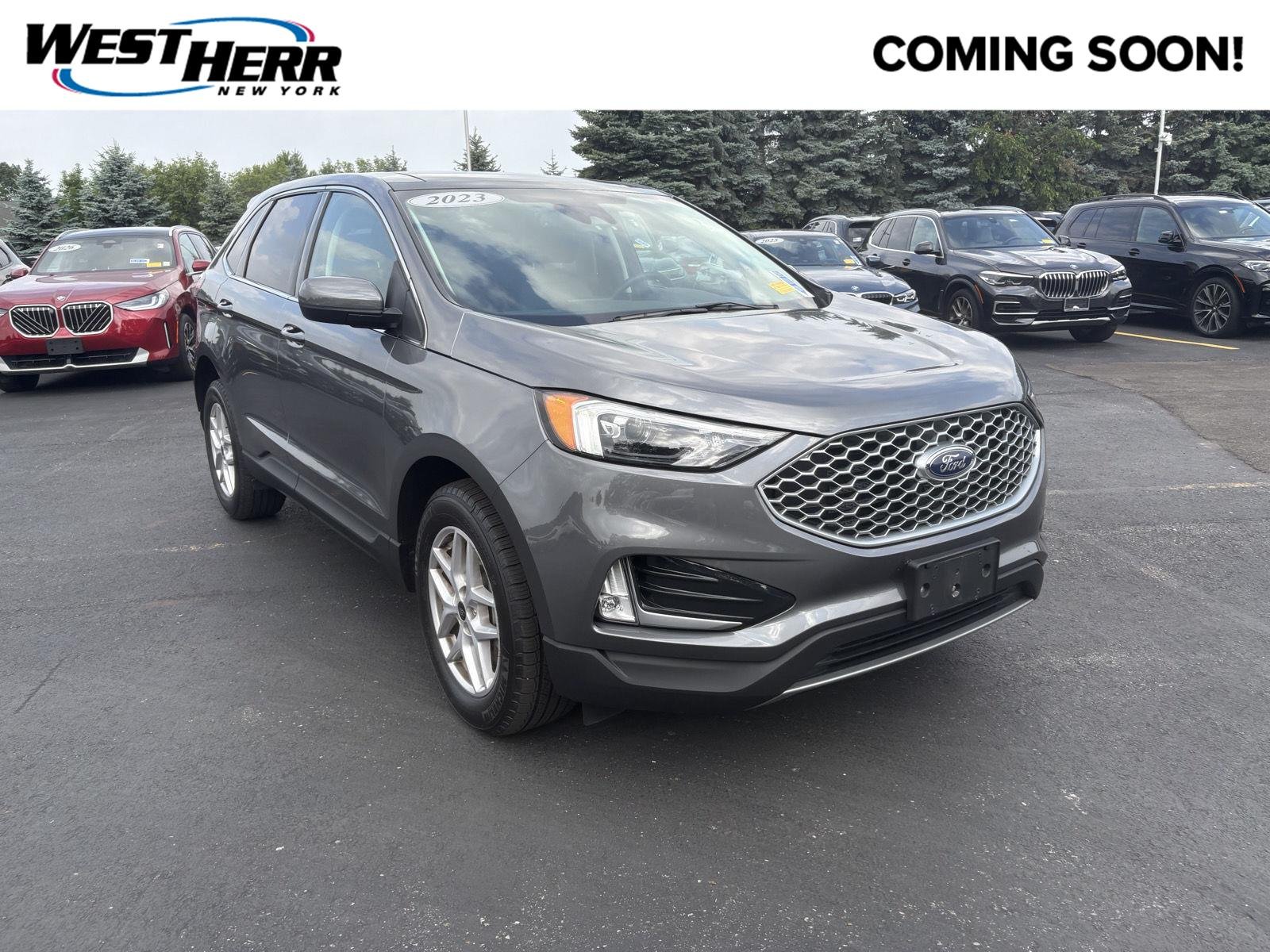 Used 2023 Carbonized Gray Ford SEL image 1
