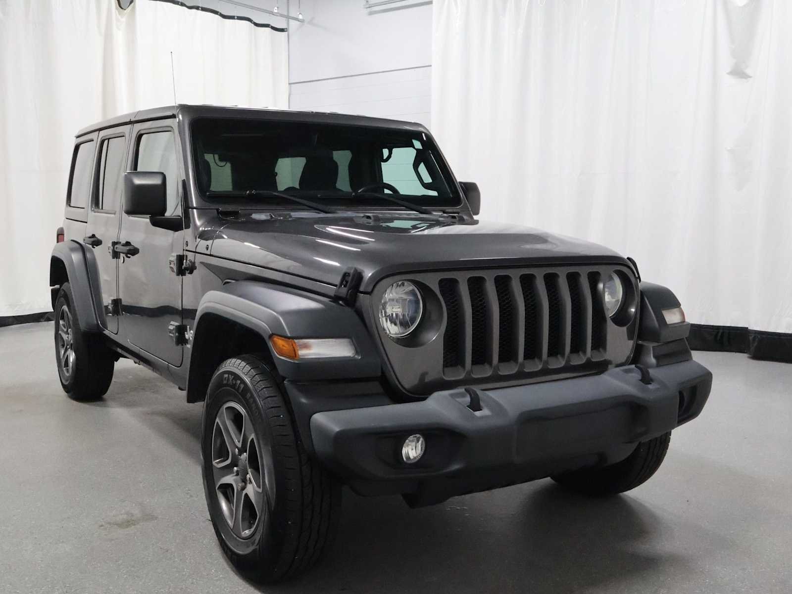 Used 2018 Granite Crystal Metallic Clearcoat Jeep Sport S image 13