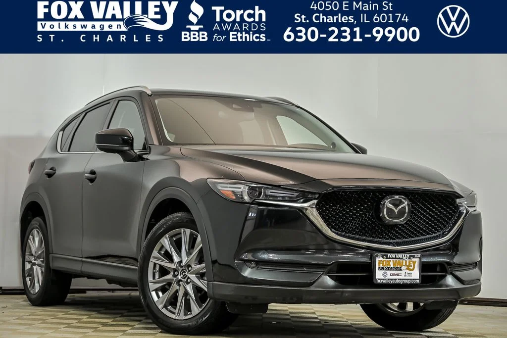 Used 2019 Black Mazda Grand Touring image 1