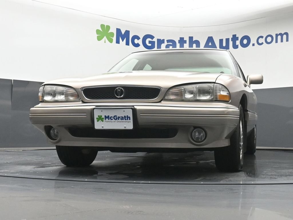 Used 1995 Beige Pontiac SE image 7