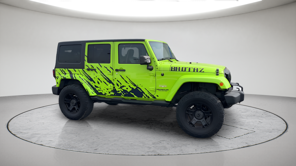 Used 2013 Green Jeep Unlimited Sahara image 3