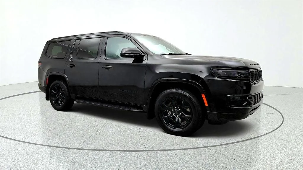 Used 2025 Diamond Black Crystal Pearlcoat Jeep Series II Carbide 4x4 w/ Rear Entertainment & 20