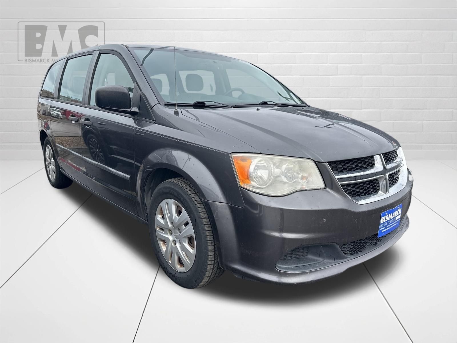 Used 2015 Dodge Grand Caravan American Value Package with VIN 2C4RDGBG1FR516977 for sale in Mandan, ND