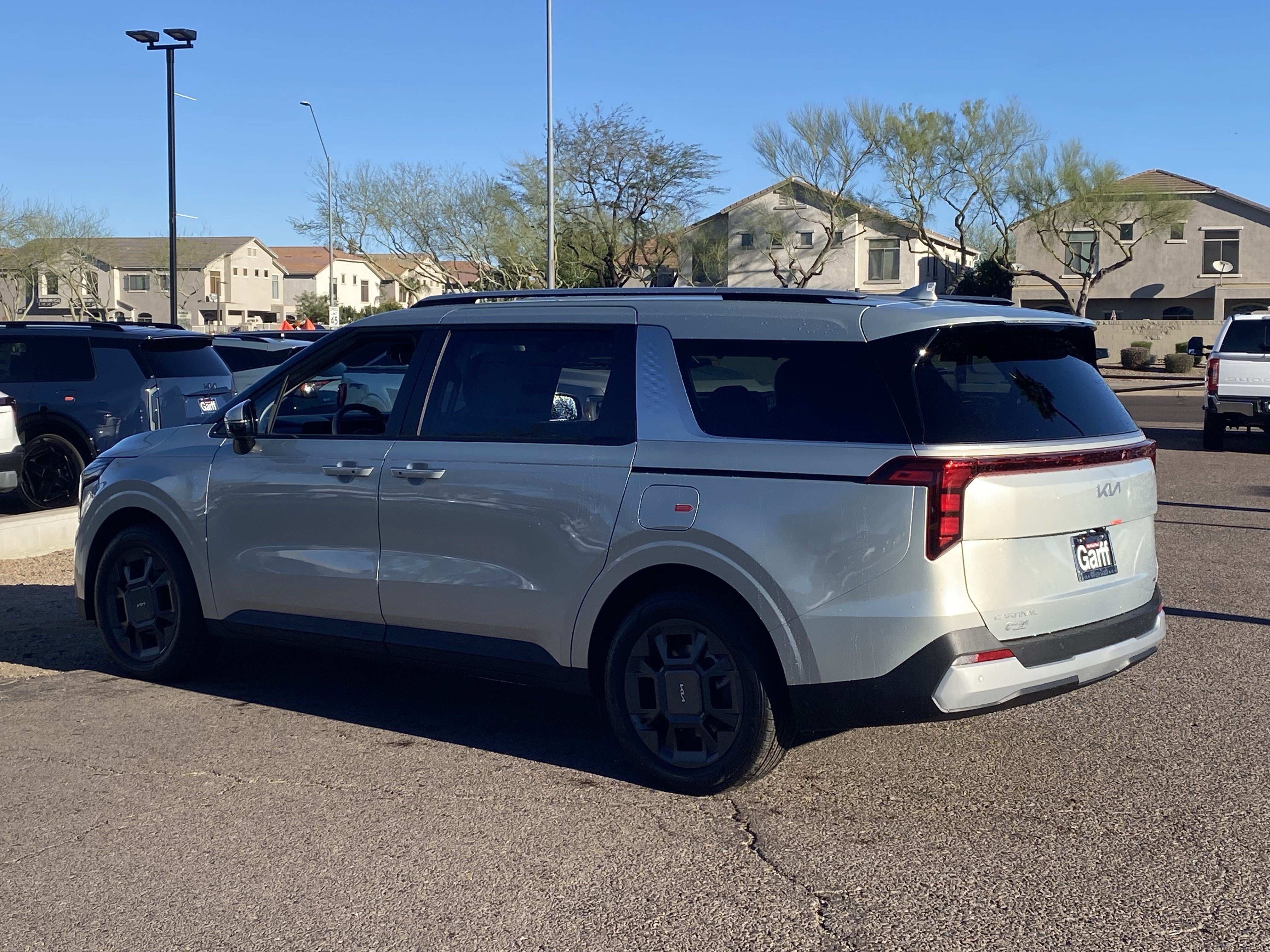 New 2026 Ivory Silver Kia EX image 3