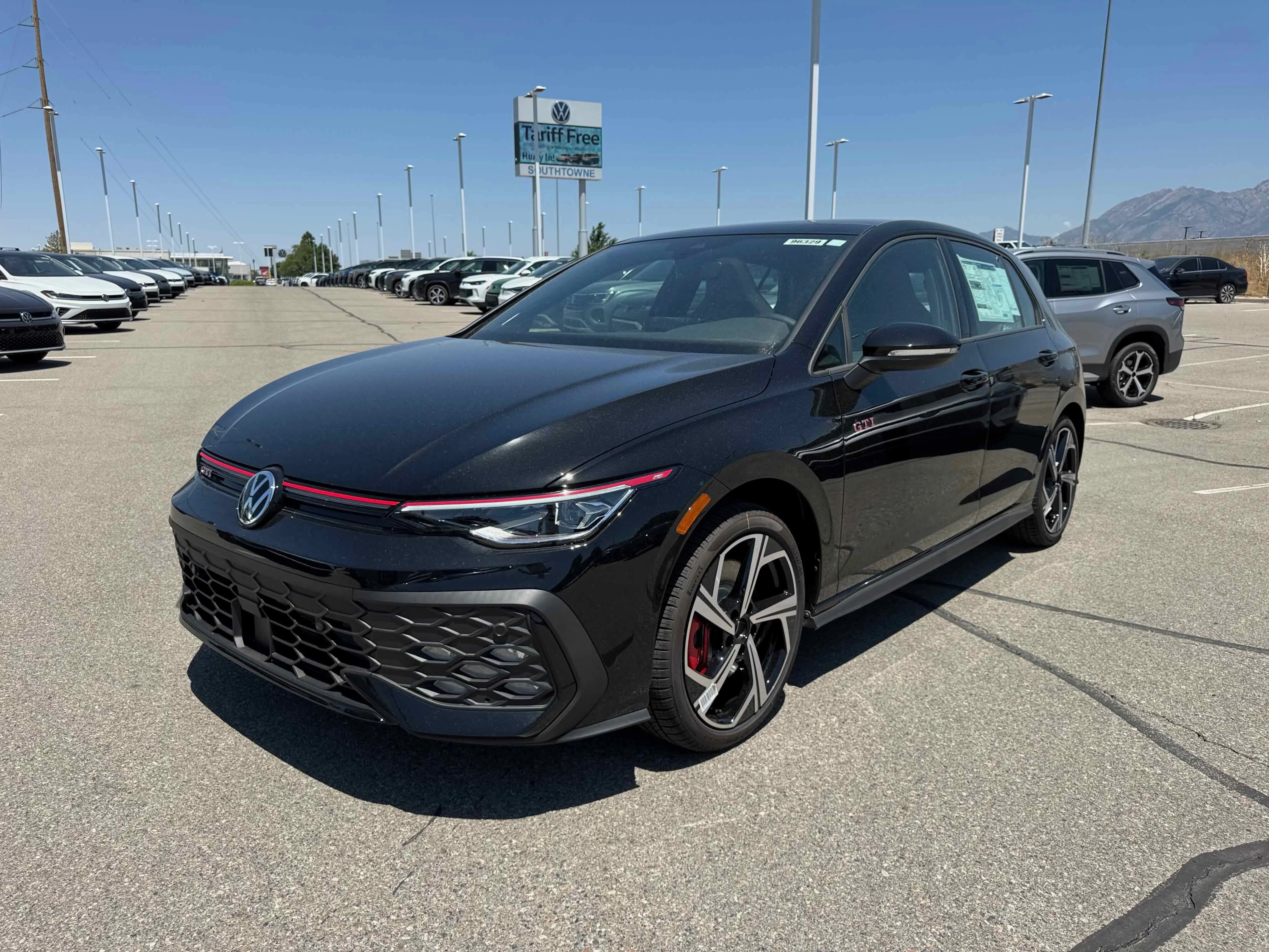 New 2025 Black Volkswagen SE image 12