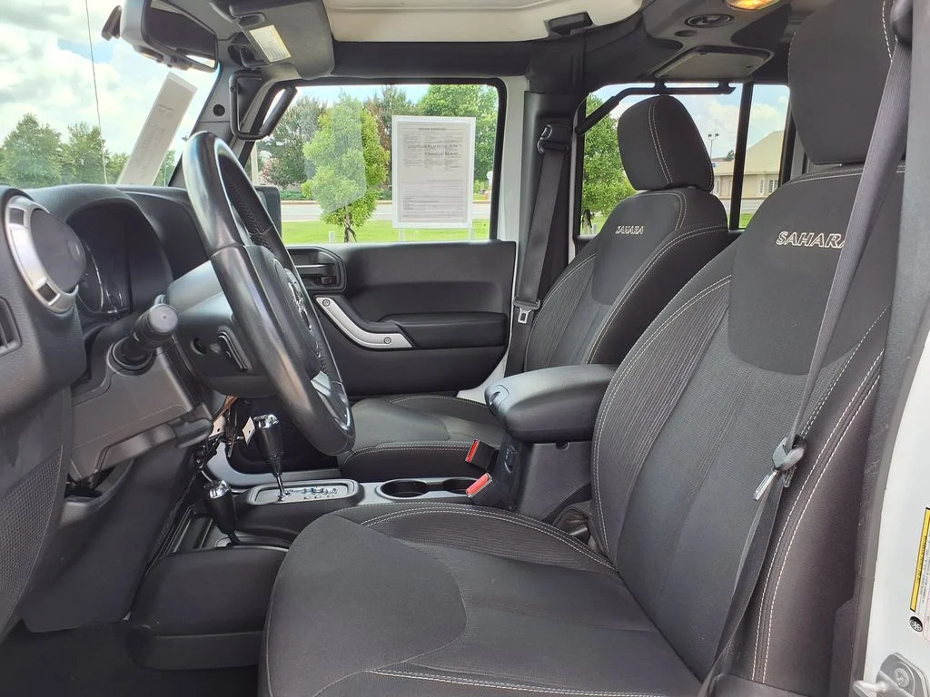 Used 2016 White Jeep Unlimited Sahara image 14