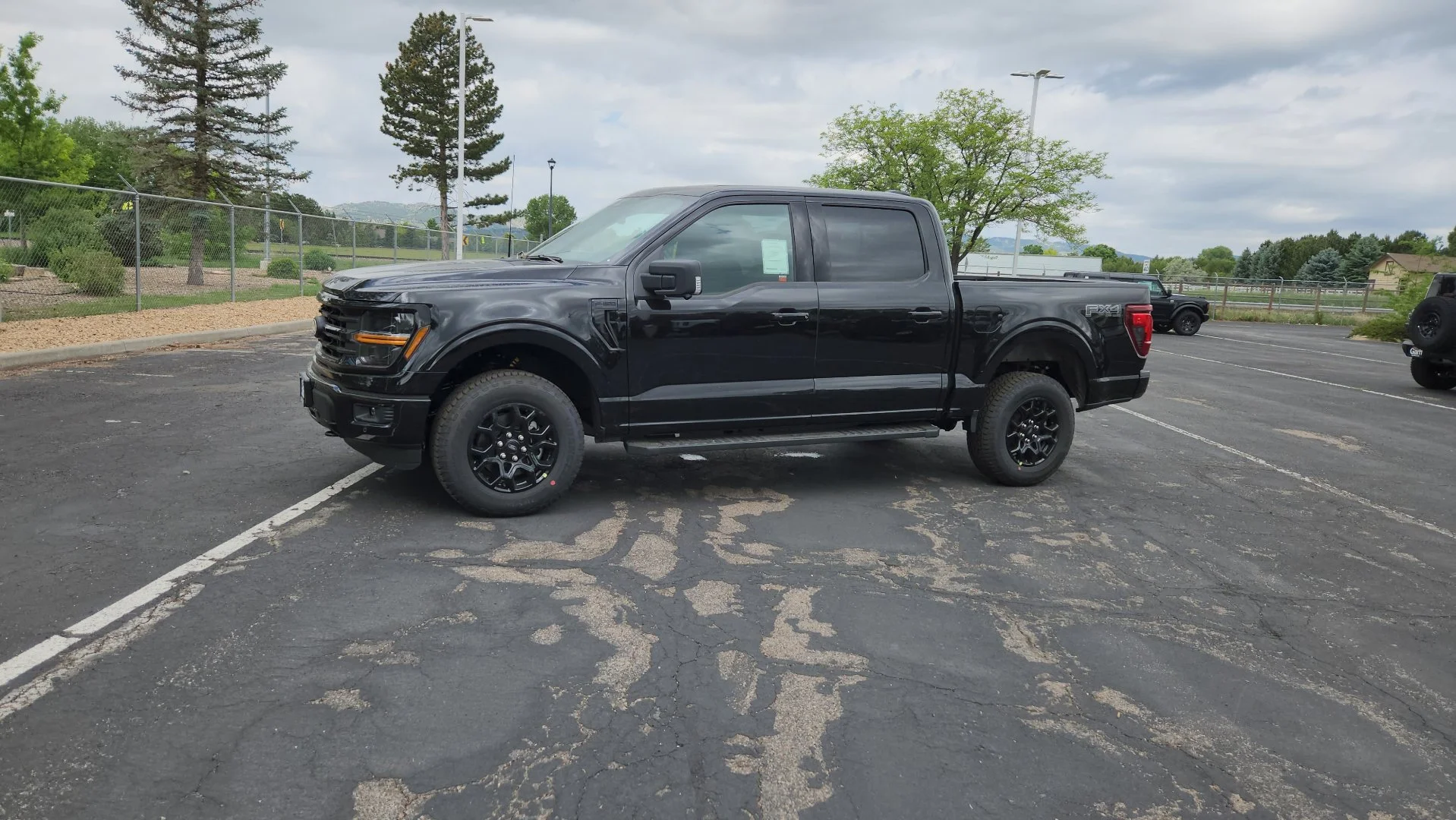 New 2026 Agate Black Metallic Ford XLT image 4