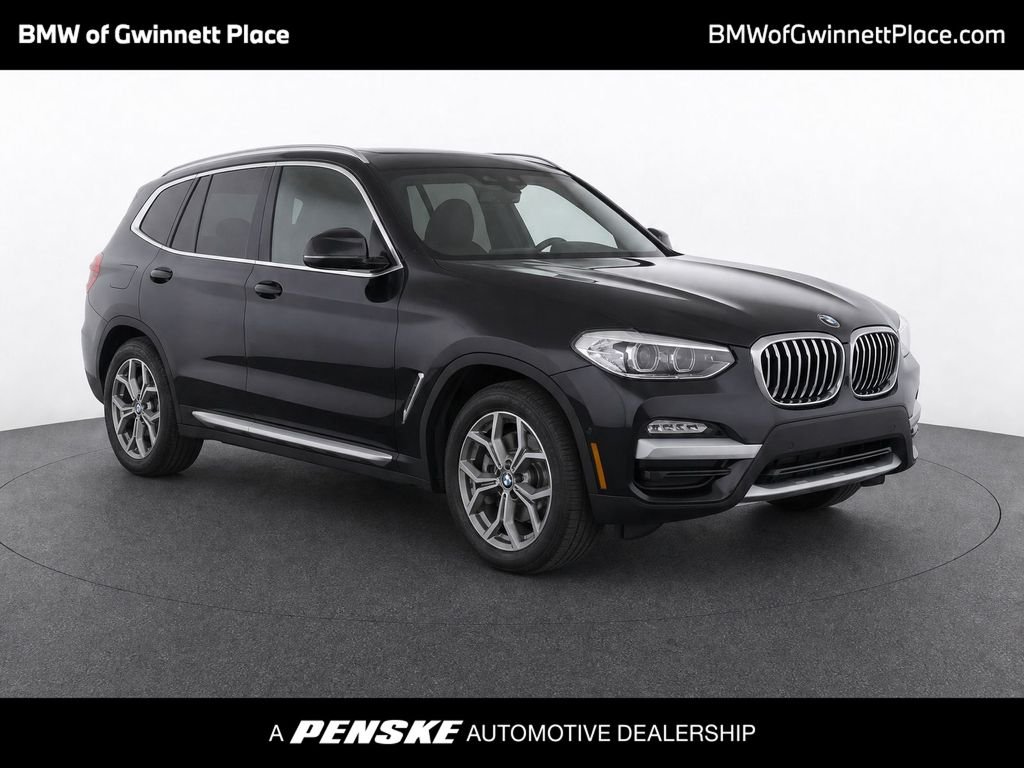 Used 2020 Jet Black BMW sDrive30i image 1