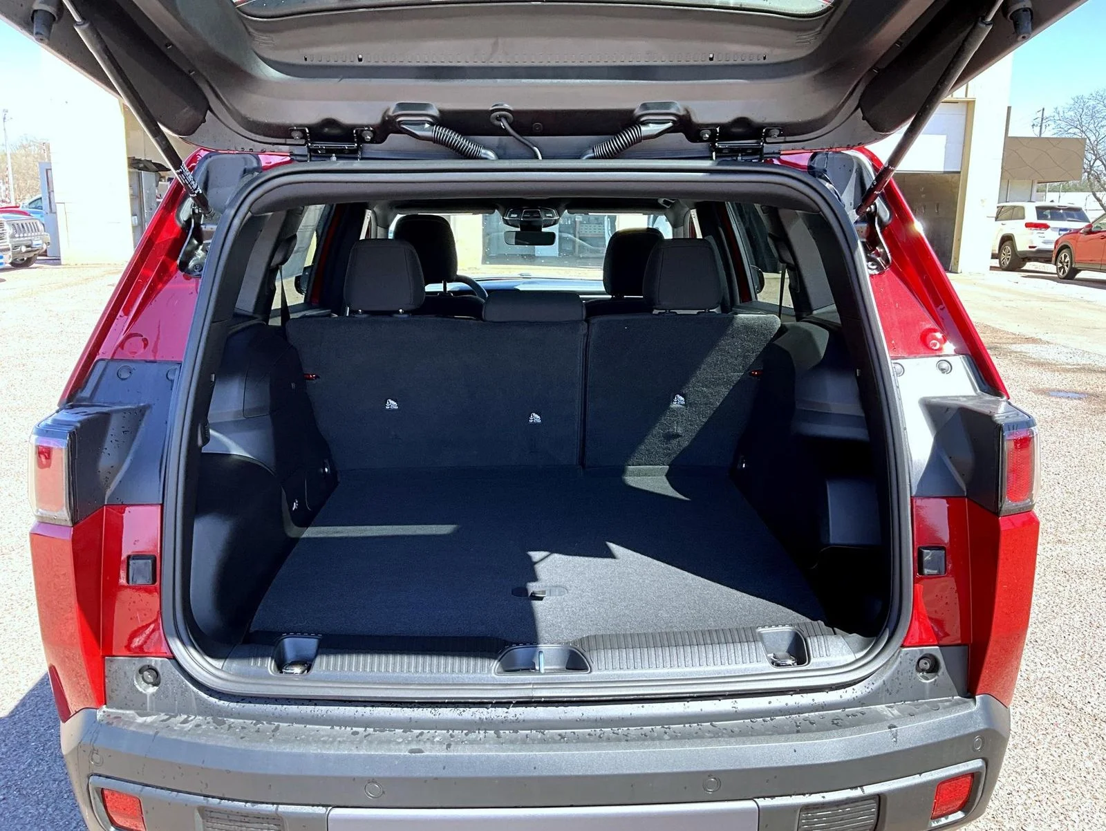 New 2026 Red Jeep Laredo image 9