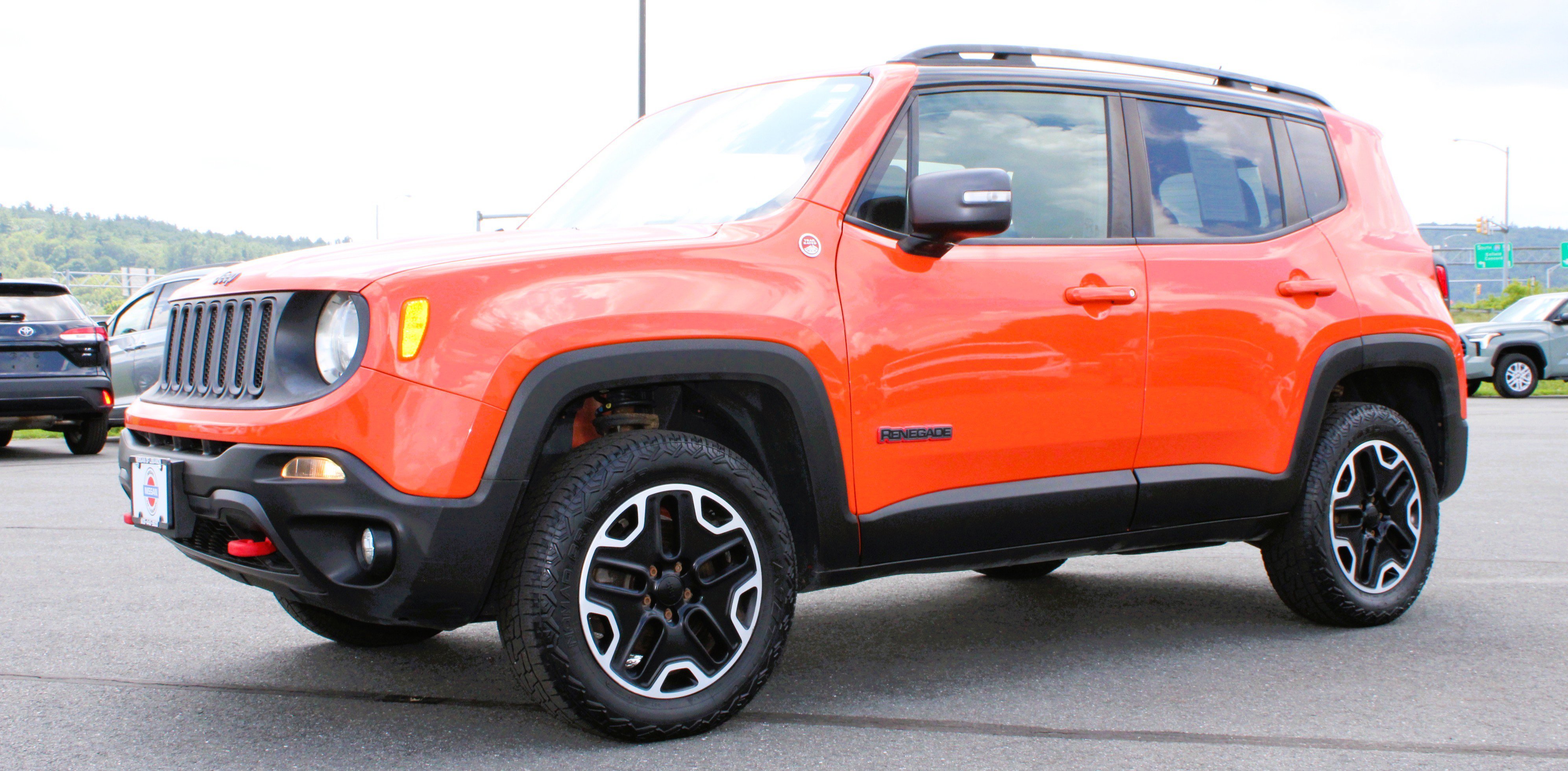 Used 2015 Omaha Orange Jeep Trailhawk image 8