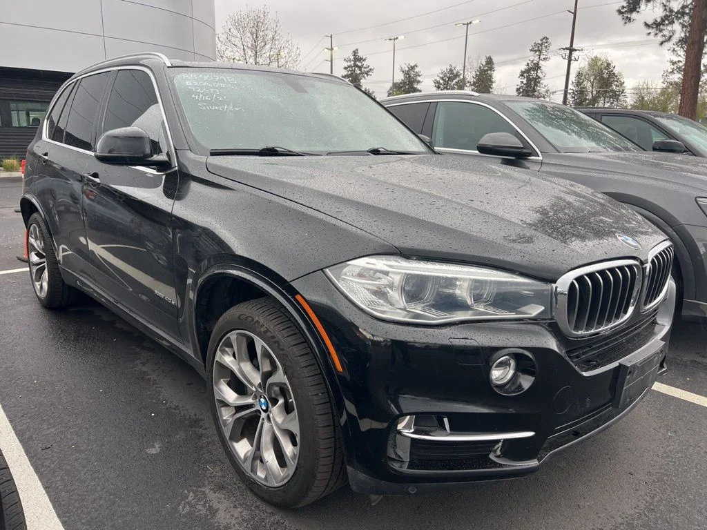 Used 2016 Black BMW xDrive40e image 1