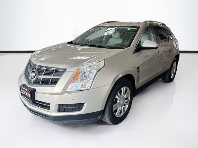 Used 2011 GOLD MIST METALLIC Cadillac Luxury Collection image 1