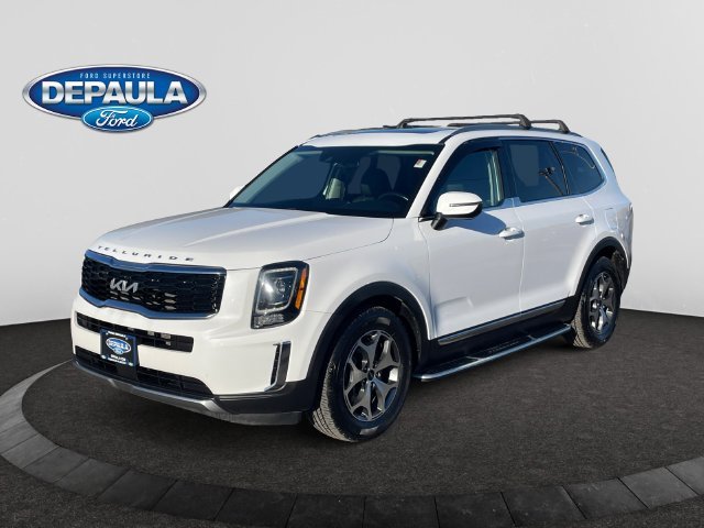 Used 2022 White Pearl Kia EX image 1