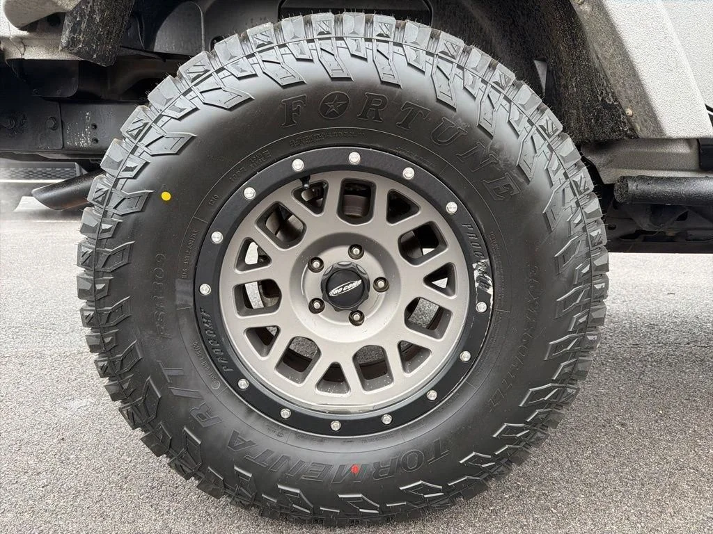 Used 2015 Silver Jeep Unlimited Sport image 13