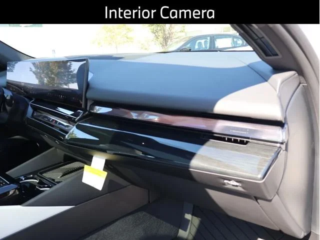 New 2026 Mineral White Metallic BMW 550e xDrive image 13