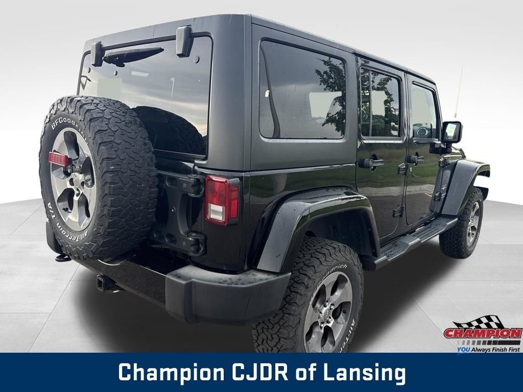 Used 2016 Black Jeep Unlimited Sahara image 7