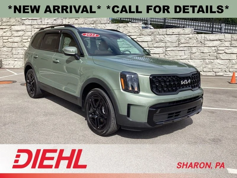 Used 2024 Green Kia EX X-Line image 1