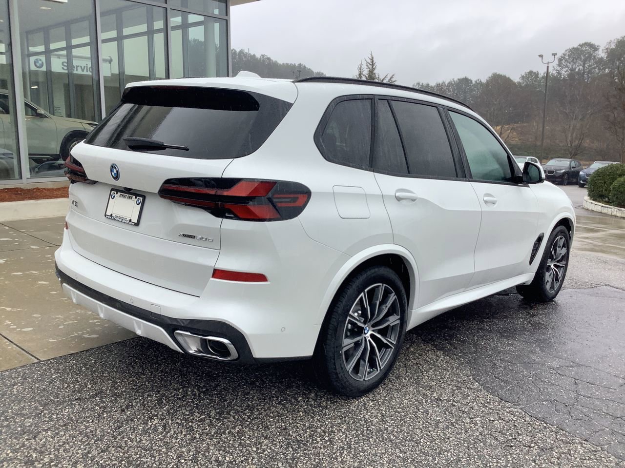 Used 2026 Mineral White Metallic BMW xDrive50e image 8