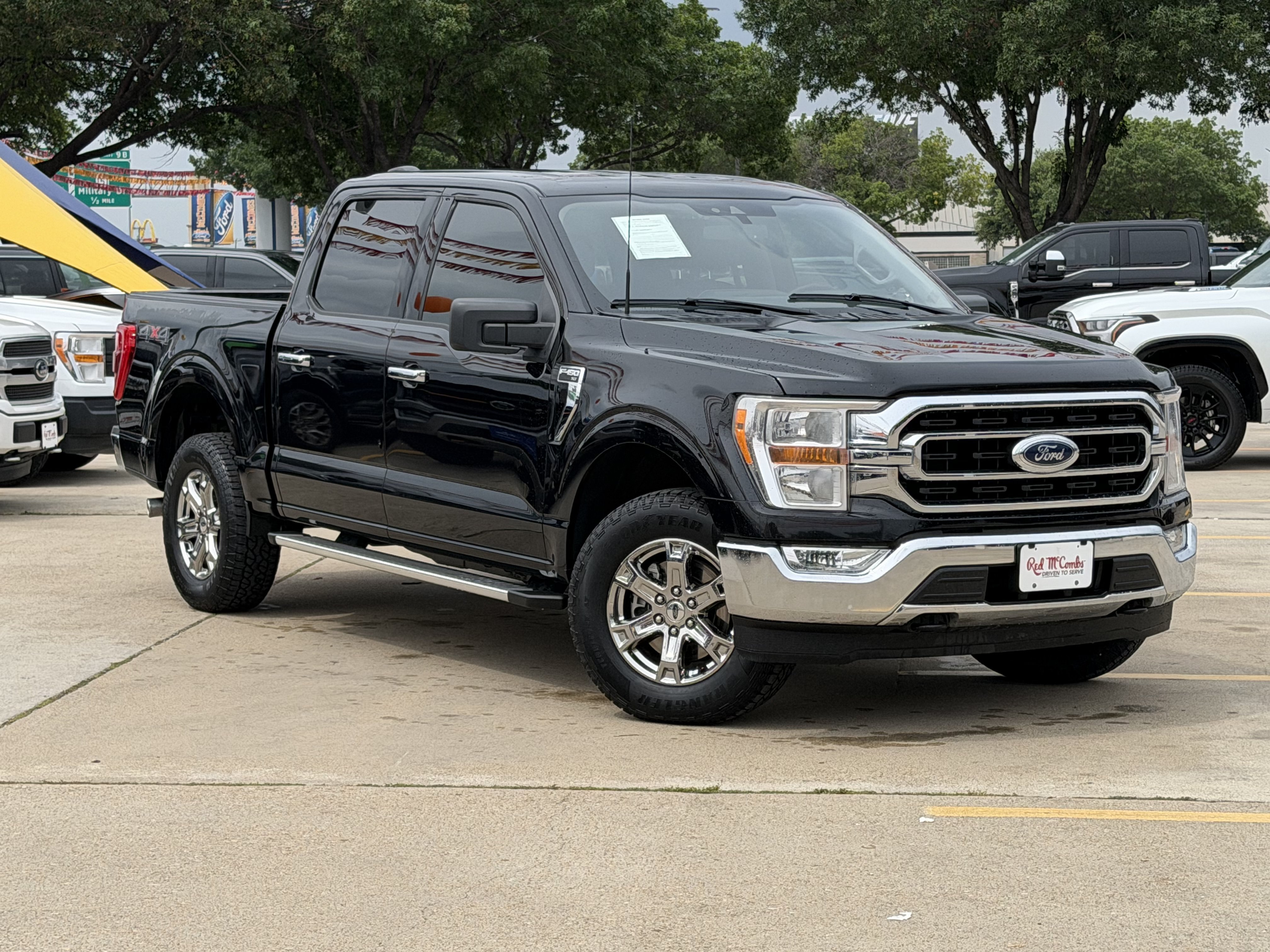 Used 2022 Agate Black Metallic Ford XLT image 1