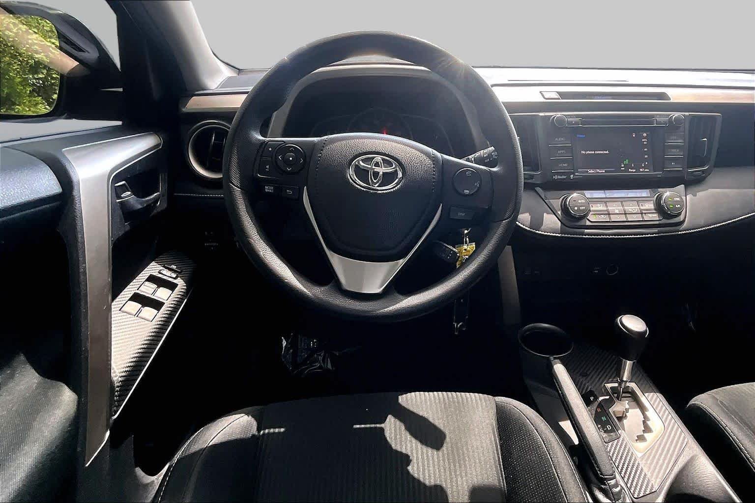 Used 2015 Magnetic Gray Metallic Toyota XLE image 6