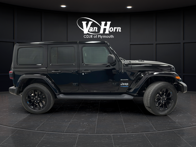 Used 2022 Jeep Wrangler Unlimited Sahara 4XE with VIN 1C4JJXP60NW229660 for sale in Plymouth, WI