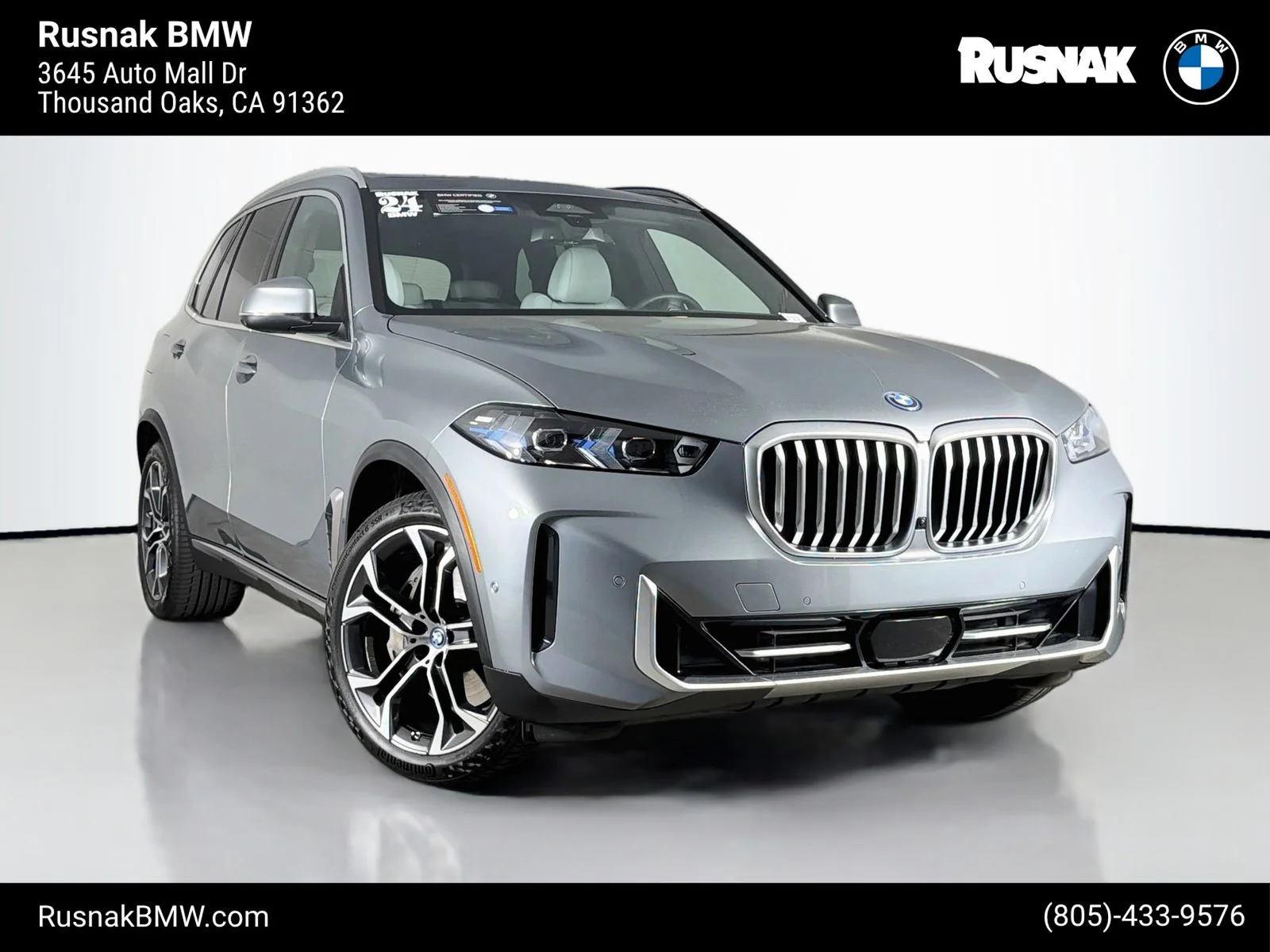 Certified Used 2024 Skyscraper Gray Metallic BMW xDrive50e image 1