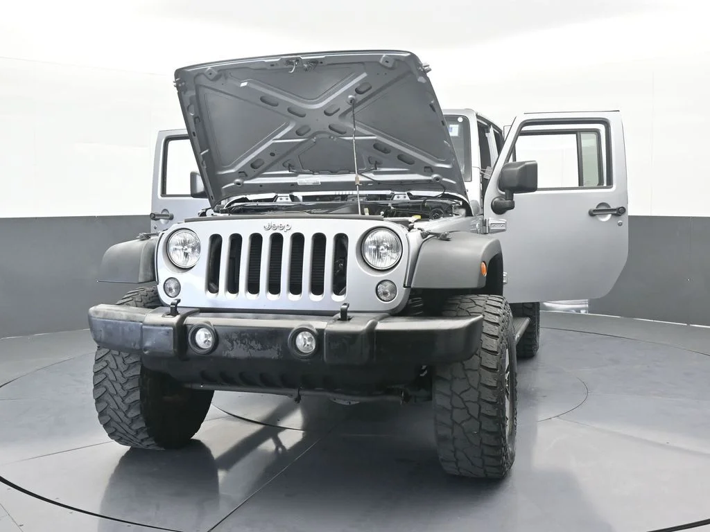 Used 2016 Billet Silver Metallic Clearcoat Jeep Unlimited Sport image 69