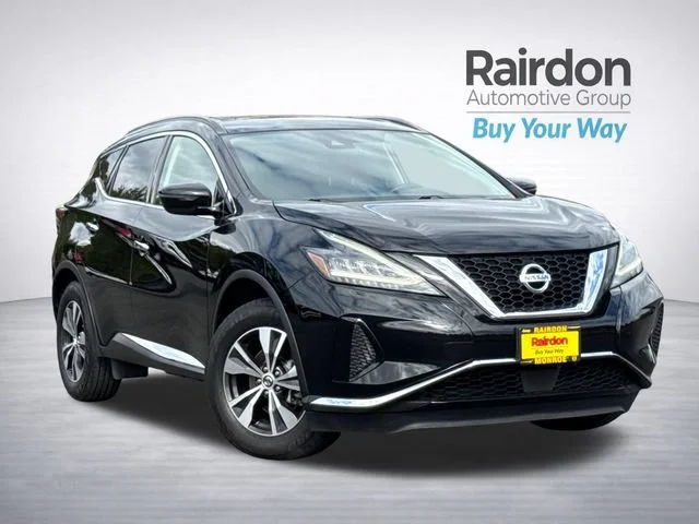 Used 2020 Super Black Metallic Nissan SV image 1