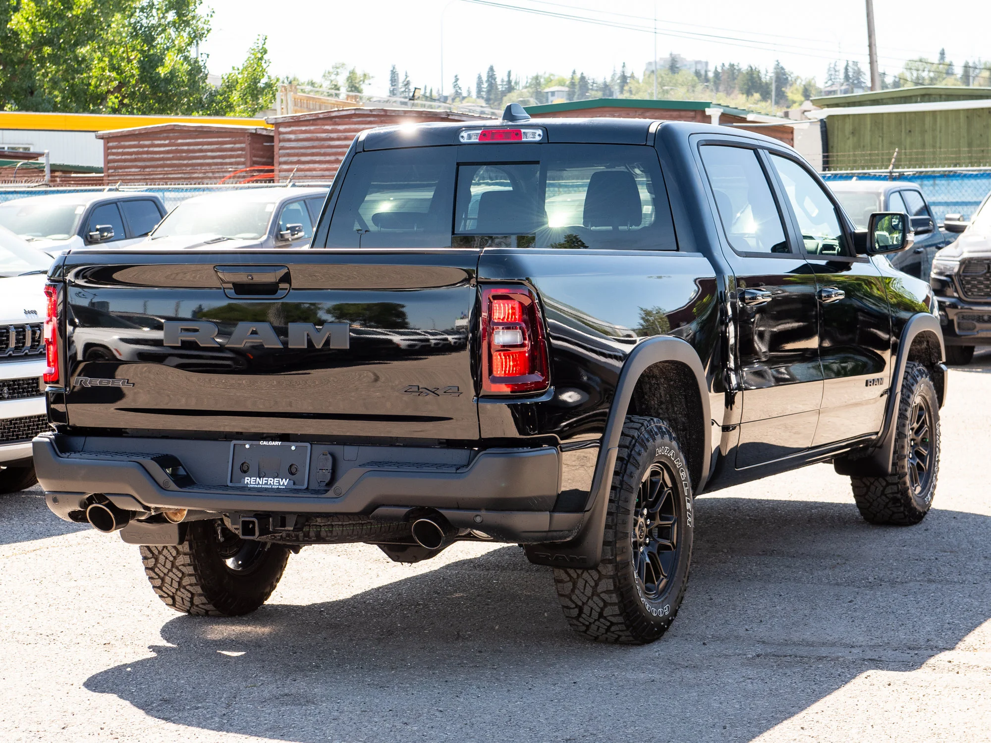 New 2026 Black RAM Rebel* Crew Cab 4x4, 33 Inch A/T Tires, Pano Sunroof, Passenger Screen image 7