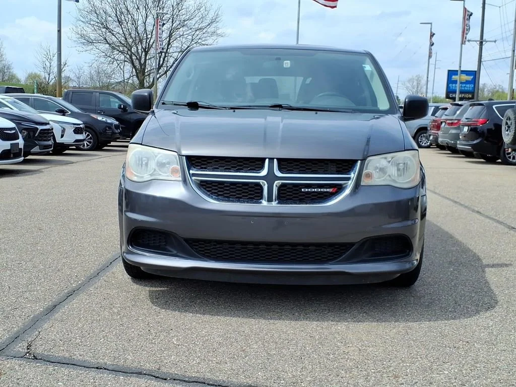 Used 2016 Dodge Grand Caravan SE with VIN 2C4RDGBG5GR335267 for sale in Howell, MI