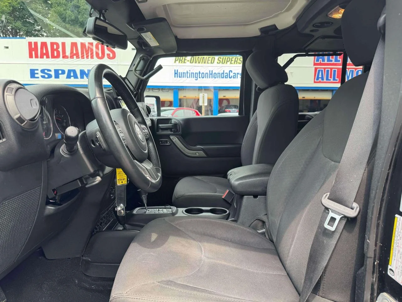 Used 2015 Black Clearcoat Jeep Sport image 18