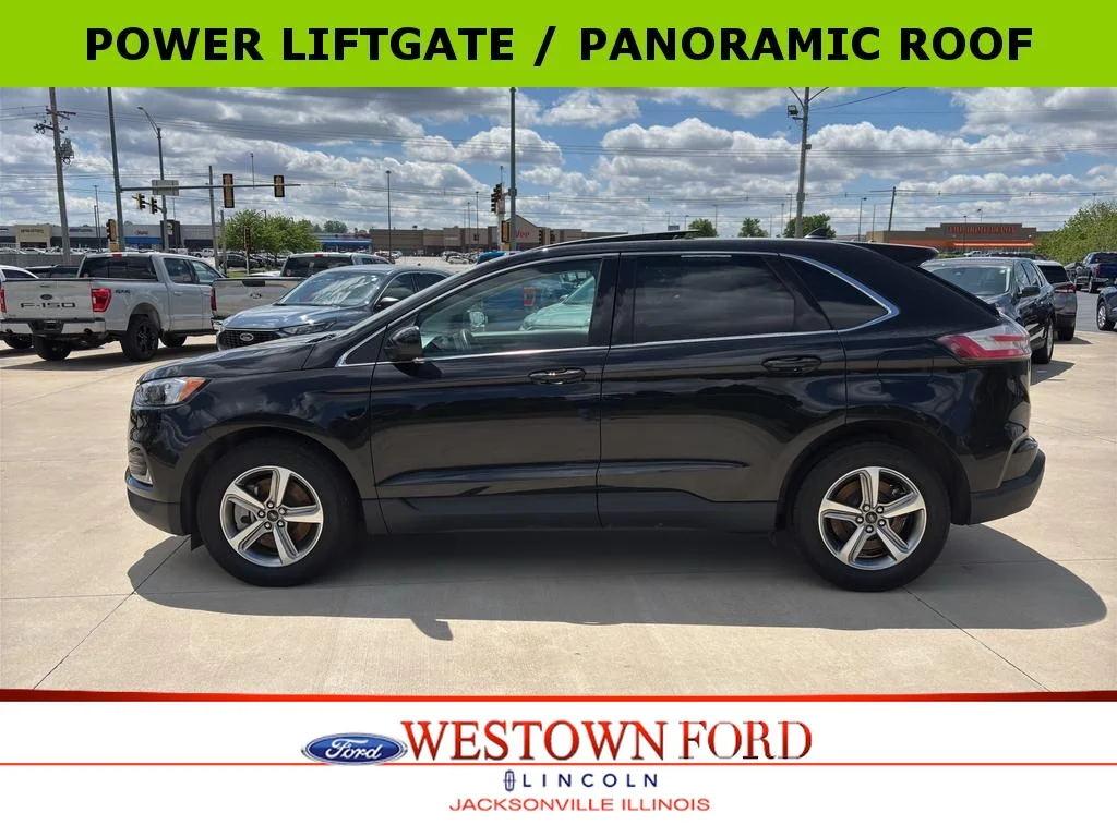 Used 2024 Agate Black Metallic Ford SEL image 1