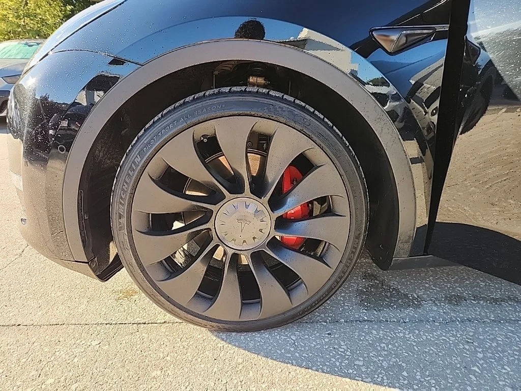 Used 2022 Solid Black Tesla Performance image 7