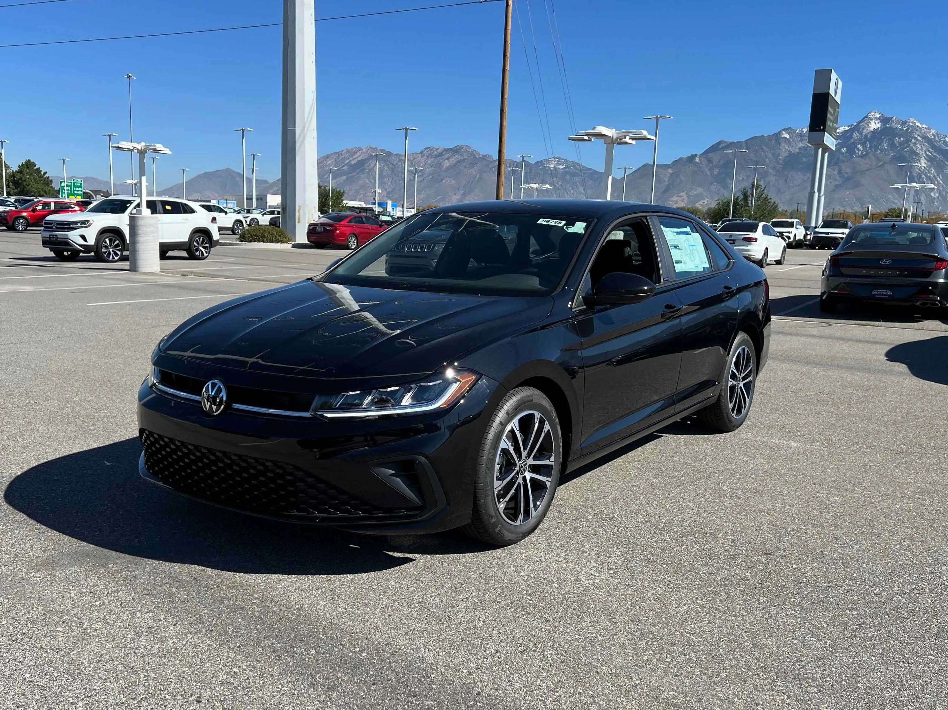 New 2026 Deep Black Volkswagen Sport image 1