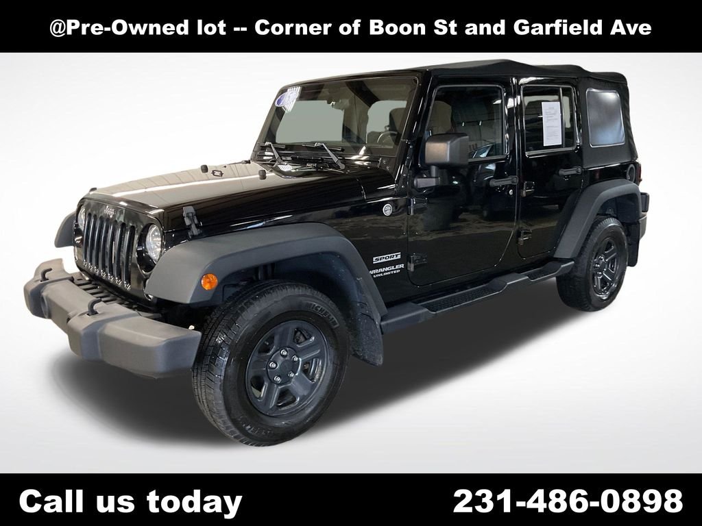 Used 2015 Black Jeep Unlimited Sport image 1
