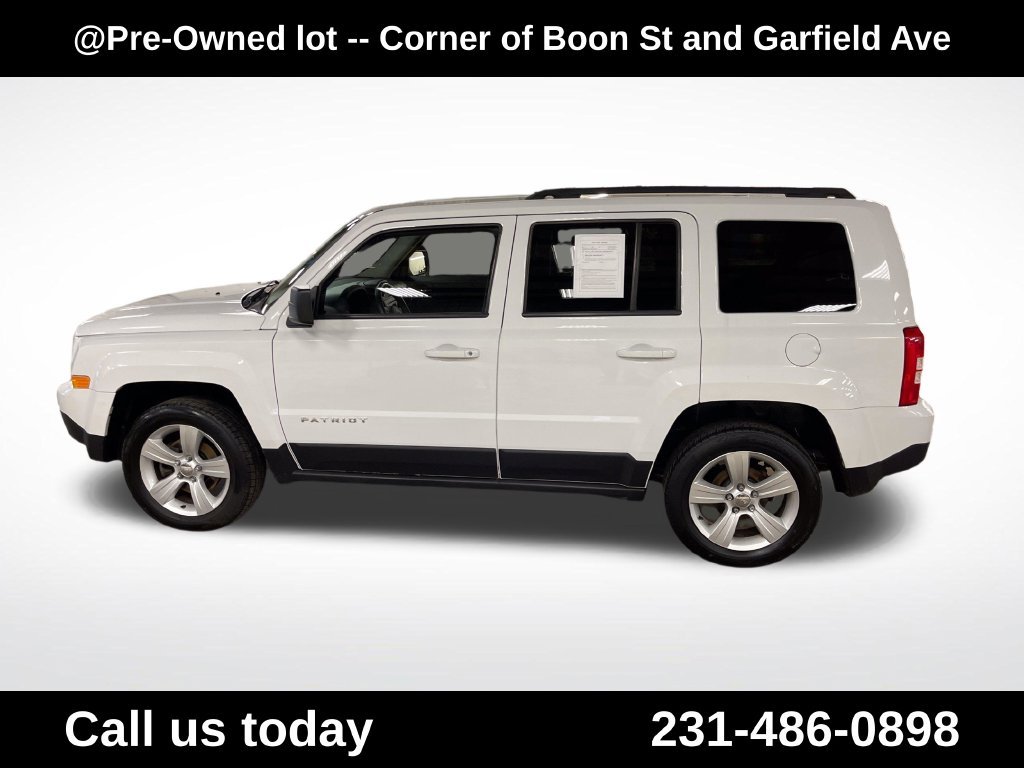 Used 2014 Jeep Patriot Latitude with VIN 1C4NJRFB2ED908658 for sale in Traverse City, MI