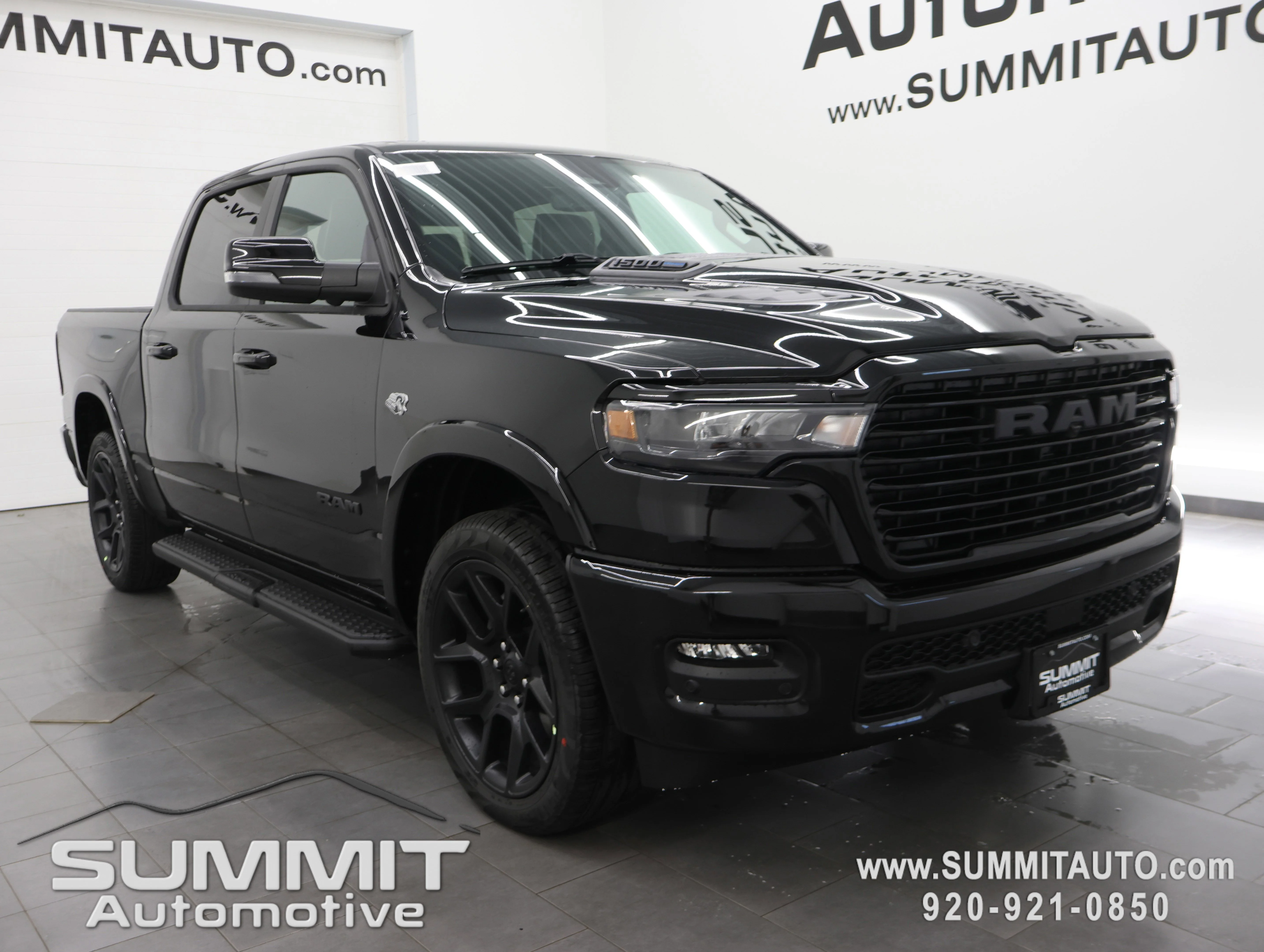 New 2026 Diamond Black Crystal Pearl-Coat Exterior Paint RAM Laramie image 2