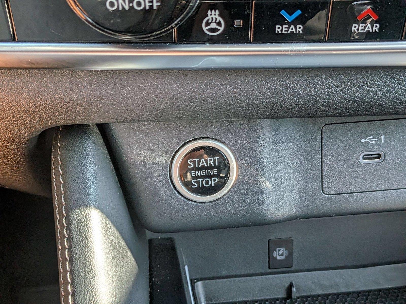 Used 2023 Champagne Silver Metallic Nissan Platinum image 30