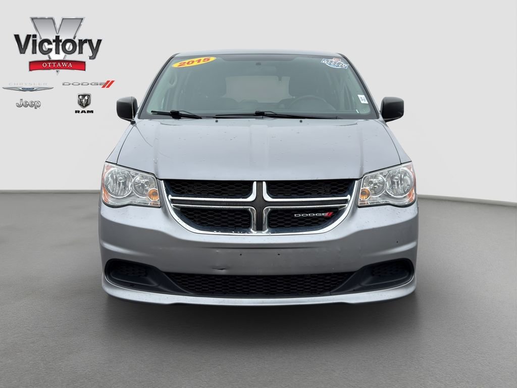 Used 2015 Dodge Grand Caravan SE with VIN 2C4RDGBG0FR667342 for sale in Kansas City
