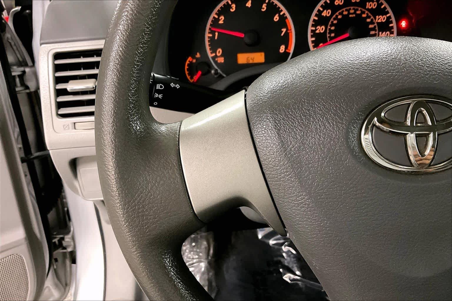 Used 2010 Classic Silver Metallic Toyota LE image 22