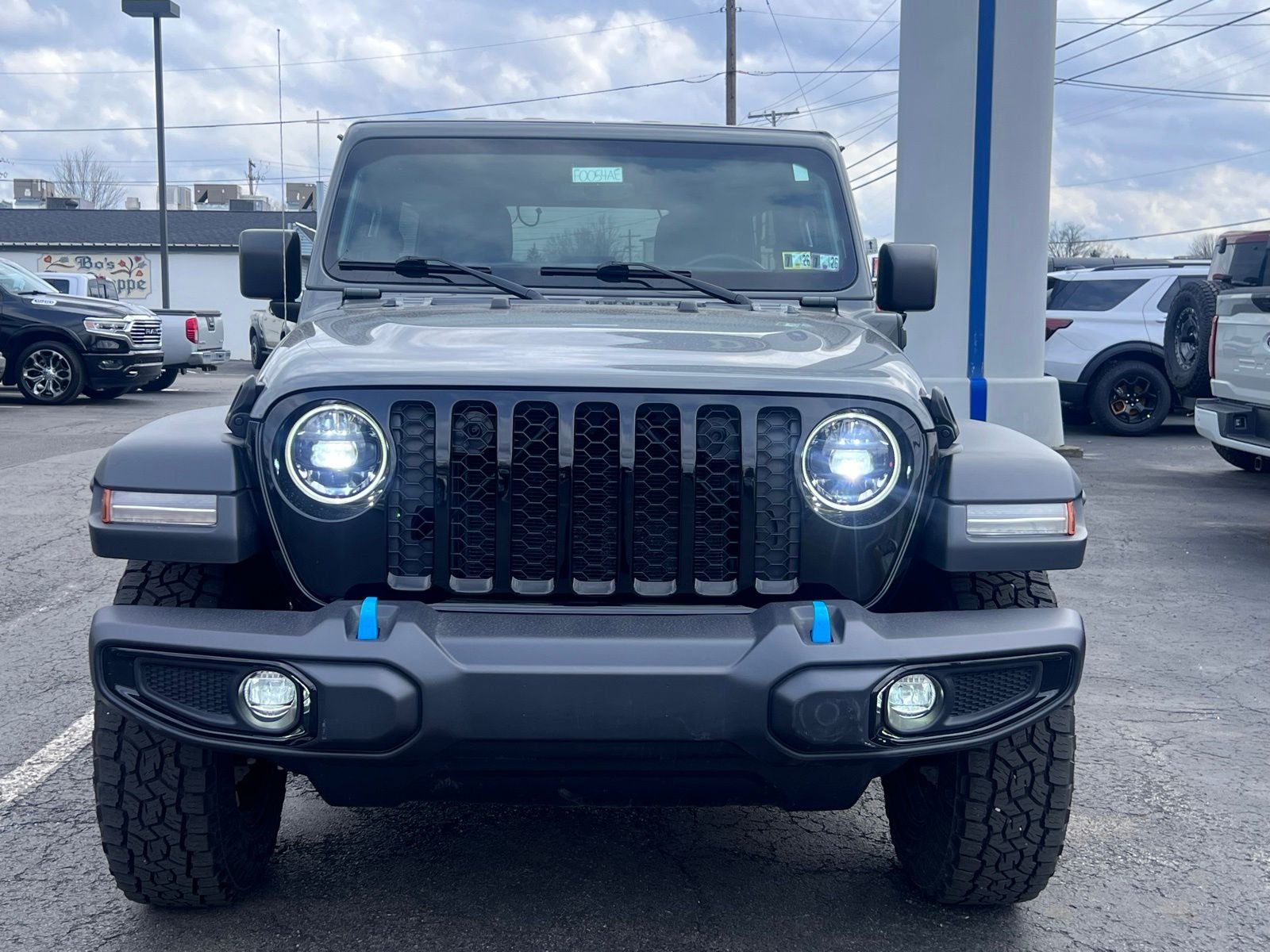 Used 2023 Jeep Wrangler 4xe Willys 4XE with VIN 1C4JJXN64PW693511 for sale in Columbiana, OH